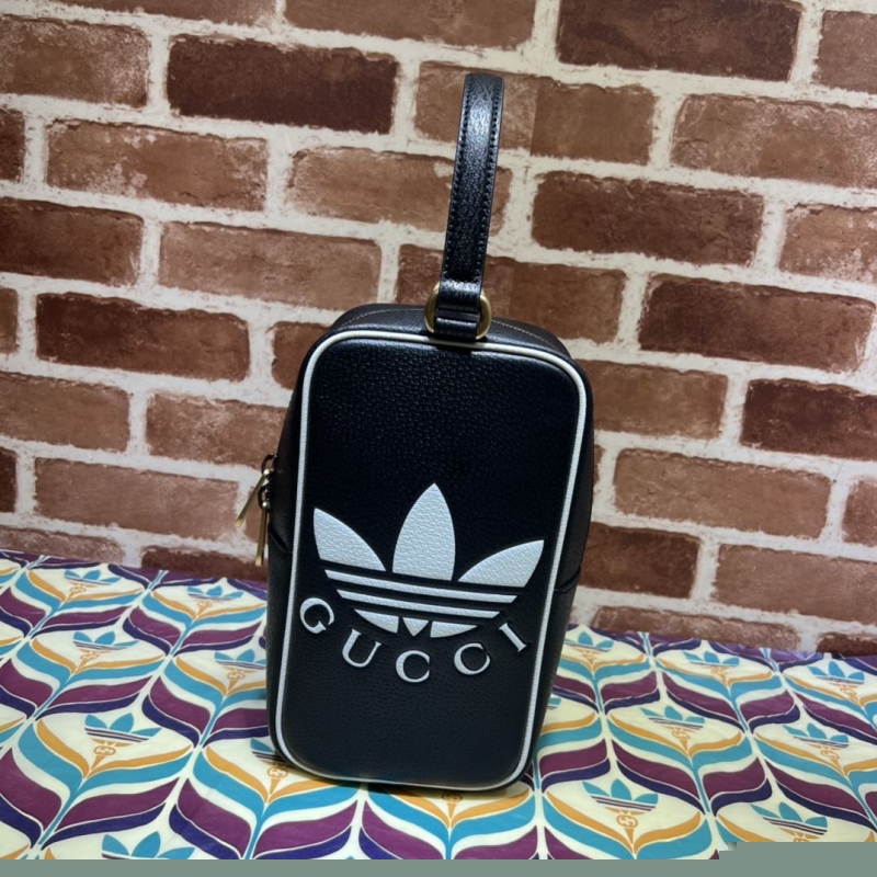 G*u*i top handle bags